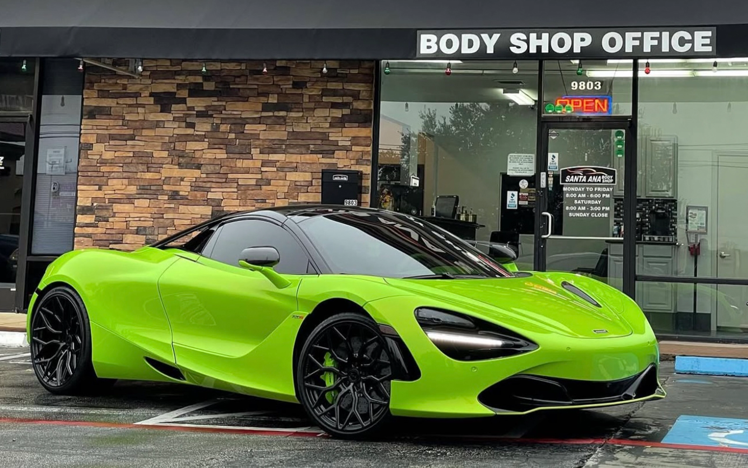 Sports car parked outside santa ana body shop